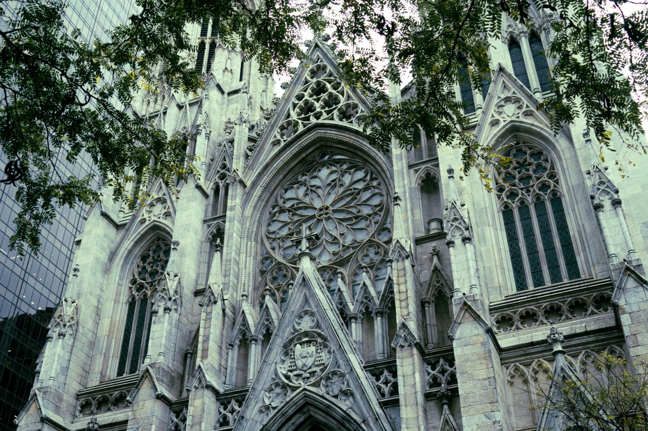 Close-up shot of the intricate facade of St. Patricks Cathedral in New York City.